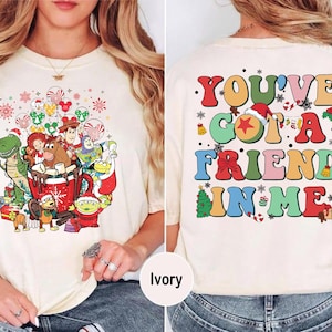 You've Got a Friend in Me Disney Christmas sweatshirt featuring Toy Story characters, ideal for family matching outfits