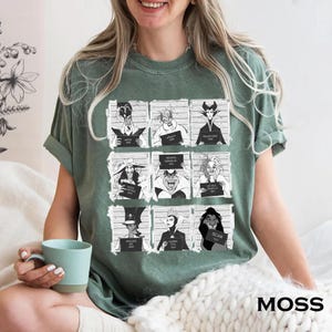 Retro Disney Villains mugshot shirt featuring lineup of Evil Queen, Ursula, Jafar, Scar, Maleficent, Cruella, Captain Hook, Dr. Facilier, and Queen of Hearts, perfect for Halloween, Disney villain fans, and Magic Kingdom group trips.