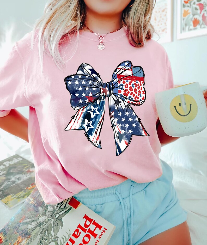 Patriotic bow shirt design with red white and blue colors stars and stripes perfect for 4th of July womens Independence Day summer outfit