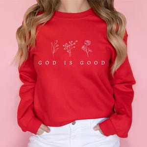 God is Good Christian Sweatshirt with floral design, faith-inspired religious apparel, perfect for church group gatherings or as a spiritual gift.