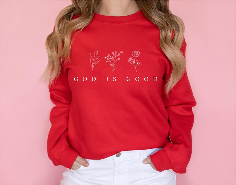 God is Good Christian Sweatshirt with floral design, faith-inspired religious apparel, perfect for church group gatherings or as a spiritual gift.