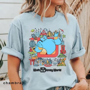 genie and aladdin disney world shirt featuring genie surrounded by disney park icons magic kingdom epcot animal kingdom hollywood studios design