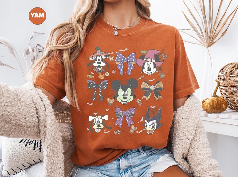 Pastel Disney Halloween shirt design featuring Mickey, Minnie, Donald, Goofy, and bows in coquette style with spider webs, candy, and spooky accents—perfect for family matching shirts and Mickey’s Not So Scary Halloween Party 2025.