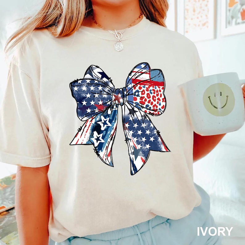 Patriotic bow shirt design with red white and blue colors stars and stripes perfect for 4th of July womens Independence Day summer outfit
