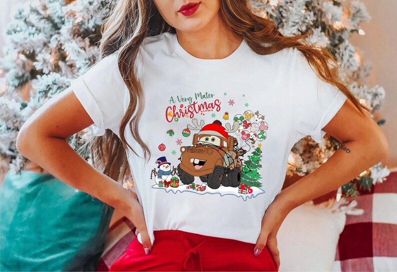 A Very Mater Christmas shirt featuring Disney Cars character Mater with Christmas lights and festive decorations, perfect holiday gift for Disney fans.