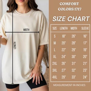 May include: A cream-colored short-sleeve t-shirt with a black graphic overlay showing length and width measurement lines. Beside the shirt is a brown chart titled COMFORT COLORS 1717 SIZE CHART with columns for size, length, width, and sleeve in inches.
