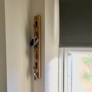 Lovely Handmade 3.5cm slim narrow Vertical Key Rail Finished in a Choice of 3 oak waxes and a choice of 3 different hook finishes