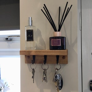 Lovely Oak Waxed slimline Key holder with shelf that would brighten up any entrance hall way choices from 3 waxes and 3 hook finishes
