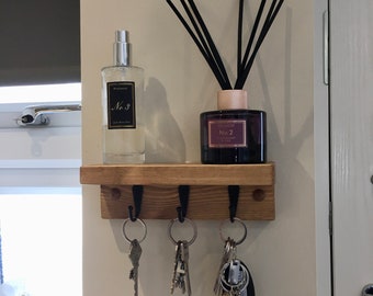 Lovely Oak Waxed slimline Key holder with shelf that would brighten up any entrance hall way choices from 3 waxes and 3 hook finishes