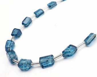 Faceted London Blue Topaz Beads: Tumble Shape, 8 Inch Strand 14-15 mm