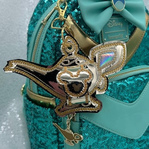 Genie lamp ear holder
