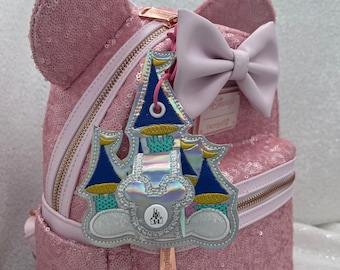 Holographic castle mouse ears holder.