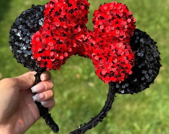 Black and Red bow sequins Minnie ears.