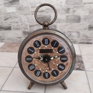 Antique Jerger Alarm Clock: Collectible Desk Clock