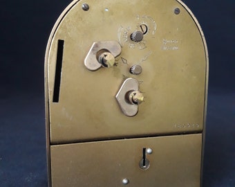 Swiza スウィザ ヴィンテージ目覚まし時計 ヴィンテージ スウィザ 目覚まし時計：スイス製貯金箱、1960年代