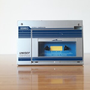 Microcassette  UNISEF M-1 Micro Pal  - Photo, audio & vidéo