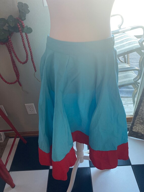 Turquoise and red hem poodle style skirt