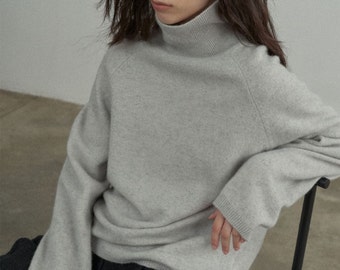 Wool Roll Neck Jumper in Grey Melange