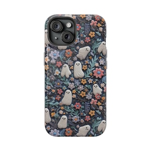 May include: A smartphone case featuring a dark blue floral pattern with white ghost figures. The case has a glossy finish and a raised design, with colorful flowers in shades of pink, orange, and yellow.