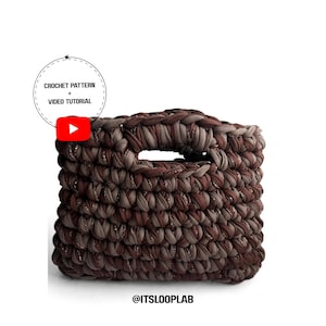 May include: A rectangular crochet handbag made from thick, dark brown and taupe yarn with subtle metallic threading. The bag features integrated handles and a textured, chunky stitch pattern. Text reads: CROCHET PATTERN + VIDEO TUTORIAL and @ITSLOOPLAB.