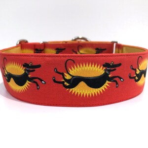 1.5” martingale collar. Richard Skipworth ‘Zoomie’ greyhound cartoon design. Adjustable slip on collar.