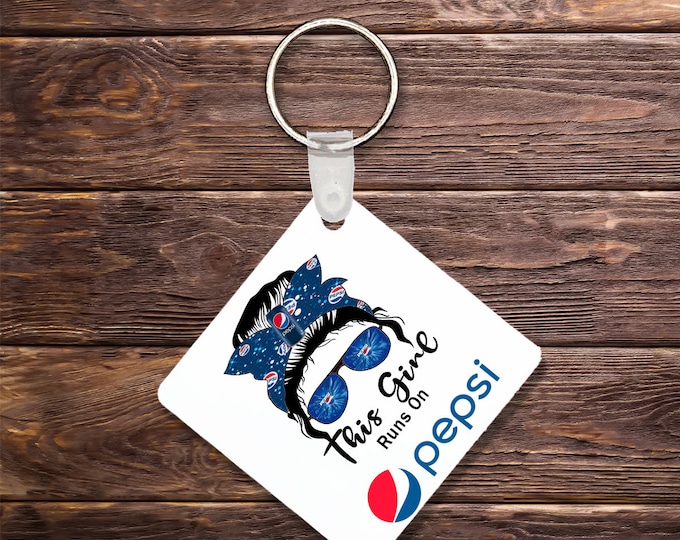 In This Girl Runs On Pep Keychain