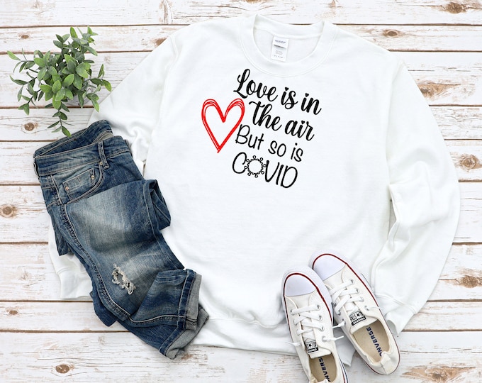 Love is in the air but so is Covid Hoodie or Sweatshirt Color Options