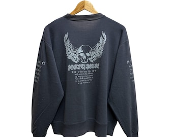 Vintage Fogaty House Graphic Sweatshirt, Skull & Wings Design
