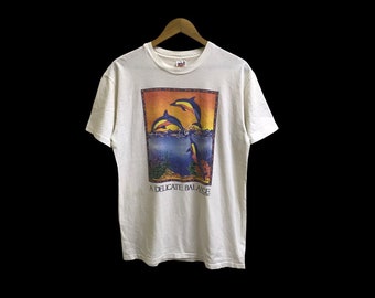 Camiseta vintage de los años 90 con i-tees humanos swea world