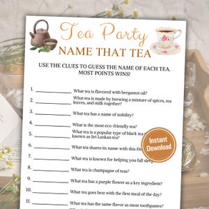 May include: A printable tea party game with the title "Tea Party Name That Tea". The game includes 11 questions about different types of tea, with blank lines for players to write in their answers. The game is designed for a tea party or other social gathering.