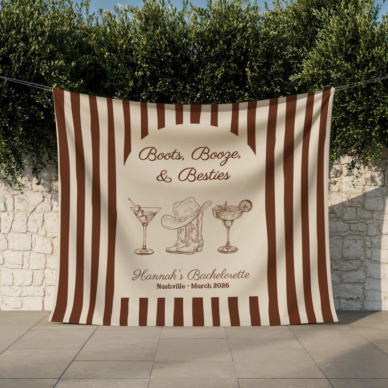 May include: A tan and brown striped backdrop with the text "Boots, Booze, & Besties" and "Hannah's Bachelorette Nashville - March 2026". The backdrop features illustrations of a cocktail, cowboy hat, cowboy boot, and margarita.