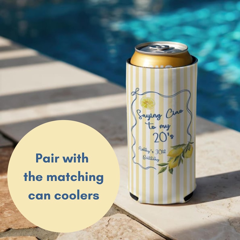 May include: A yellow and white striped can cooler with the text "Saying Ciao to my 20's" and a lemon illustration. The cooler is designed to keep beverages cold. The background shows a pool.