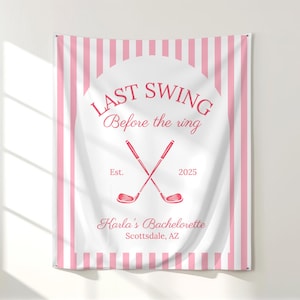 May include: A pink and white striped banner with the text "LAST SWING Before the ring" in a script font. Two crossed golf clubs are in the center. The text "Karla's Bachelorette Scottsdale, AZ" is at the bottom.