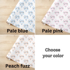 May include: Three different colored wrapping paper designs with the text "Happy 21st Birthday" repeated on each. The colors are pale blue, pale pink, and peach fuzz.