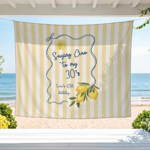 May include: A yellow and white striped banner with the text "Saying Ciao to my 30's" and "Sara's 40th Birthday" in a blue frame. The banner also features a lemon illustration and a lemon branch.