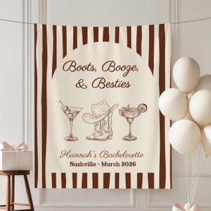 May include: A cream-colored banner with brown vertical stripes and the text "Boots, Booze, & Besties." Below are illustrations of a martini, cowboy hat and boots, and a margarita. The text "Hannah's Bachelorette, Nashville - March 2026" is also present.
