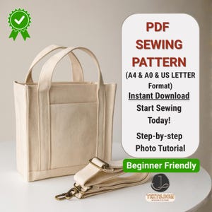 May include: A beige canvas tote bag with a matching adjustable shoulder strap. The image includes text that reads "PDF Sewing Pattern" and "Beginner Friendly". The bag has two handles and a front pocket.