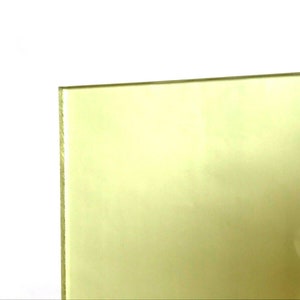 May include: A sheet of translucent yellow acrylic plastic.