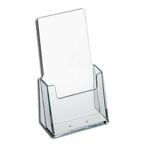 May include: Clear acrylic brochure holder with a single slot for holding pamphlets or flyers. The holder is designed to stand upright on a counter or table.