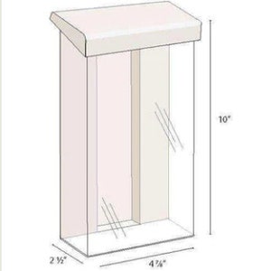 May include: Clear acrylic pamphlet holder with a white top and a slanted roof. The holder is 10 inches tall, 4 1/2 inches wide, and 2 1/2 inches deep.