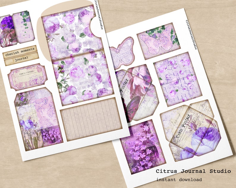 May include: Printable digital paper pack with purple floral and butterfly designs. The pack includes a variety of elements, including envelopes, labels, and journal cards. The text "cherish moments journal" is included on one of the labels.