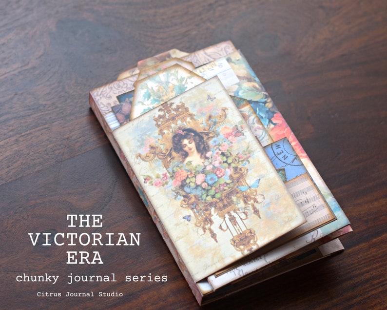 May include: A vintage-inspired journal with a floral and gold design. The cover features a woman with long dark hair and a floral crown. The journal is part of a series called "The Victorian Era chunky journal series" by Citrus Journal Studio.