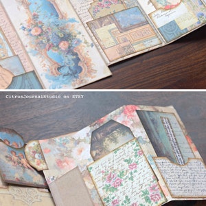May include: A multi-page scrapbook with a vintage aesthetic. The pages are decorated with floral patterns, handwritten text, and images. The scrapbook is closed, but the pages are visible, revealing the intricate details.