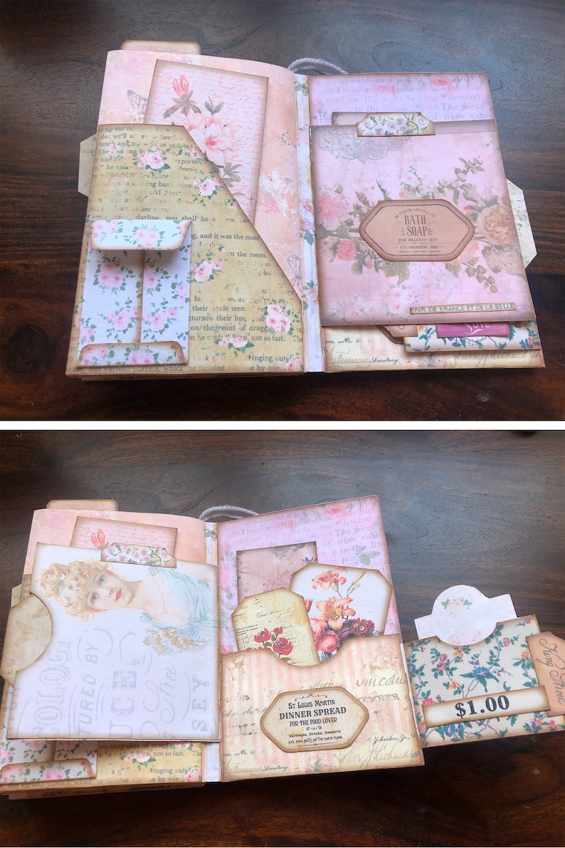 May include: An open scrapbook with a pink and white floral theme. The scrapbook has several pockets and tabs, and is decorated with various paper embellishments, including a tag that reads "Bath Soap".