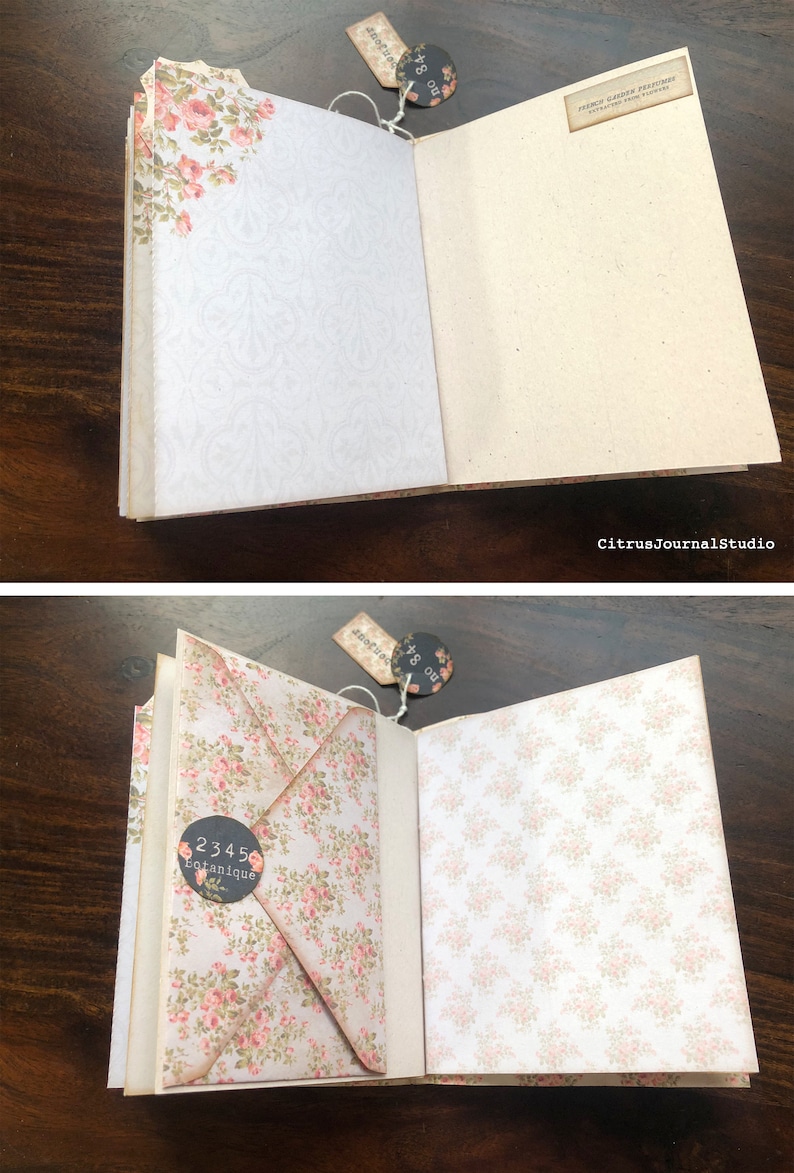 May include: Open journal with floral patterned pages. The left page has a floral envelope with a black circle sticker that says "2345 botanique". The right page has a floral pattern. The top of the journal has a tag that says "no 84" and another tag that says "French Garden Treasures - Everything for your garden".