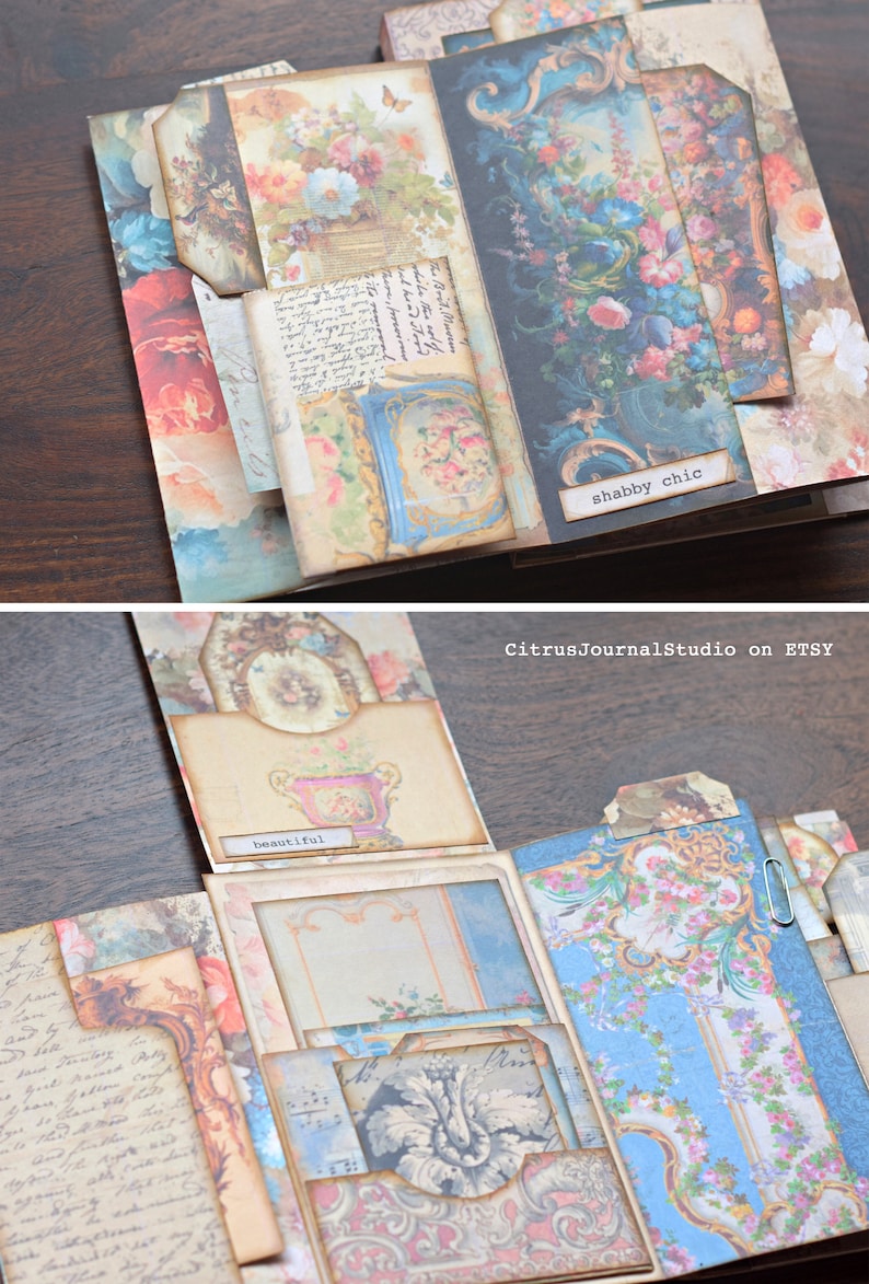 May include: A multi-layered scrapbook with floral and patterned paper, featuring a variety of pockets and tabs. The scrapbook is decorated with vintage-style embellishments and includes the text "shabby chic" and "beautiful".