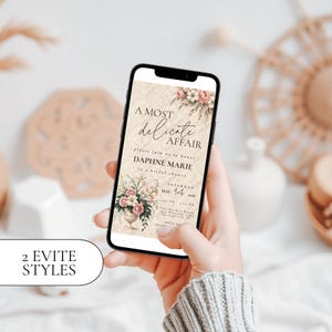 May include: A smartphone displays a bridal shower invitation with floral accents and the text "A Most Delicate Affair." The invitation includes details for Daphne Marie's shower on May 14, 2026. The image also shows "2 Evite Styles."
