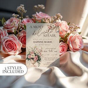 May include: A bridal shower invitation with the text "A Most Delicate Affair" and "Daphne Marie" is surrounded by pink roses. The invitation includes the date, May 14, 2026, and the time. The words "3 Styles Included" are also visible.