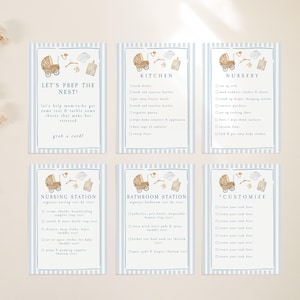 Puede incluir: Seis tarjetas con un borde a rayas azules y blancas, con ilustraciones de acuarela de un cochecito de bebé y utensilios de cocina. Las tarjetas tienen texto como "Let's Prep the Nest!" y listas de verificación.