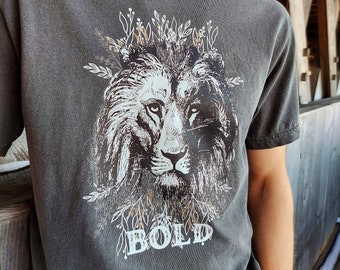 BOLD Graphic T-Shirt | Proverbs 28:1 Christian Apparel Black Gray Charcoal White Lion Grunge Faith Graphic Tee